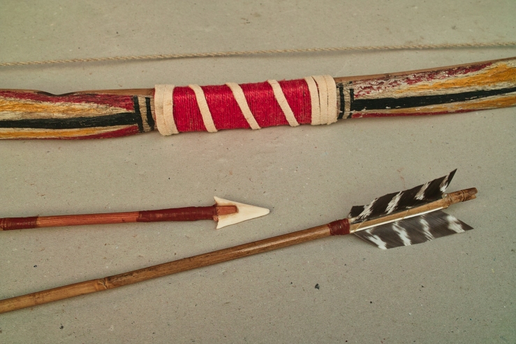 The arrows and the handle of the bow- wrapped with red dyed linen and deer- hide tanned with fat.  The bow is 37" in length, it draws 18" at 40lbs. This set is a quite fast shooter.